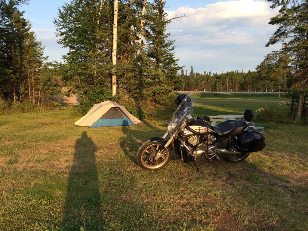 The photographers shadow stretches across the campsite for the evening at Nipigon, ON.
