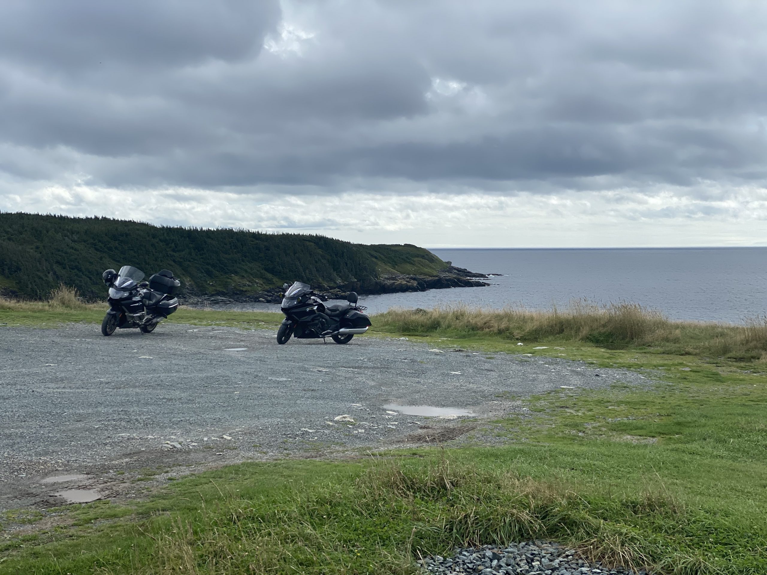 The bikes overlook the Ferryland coastline in Newfoundland.