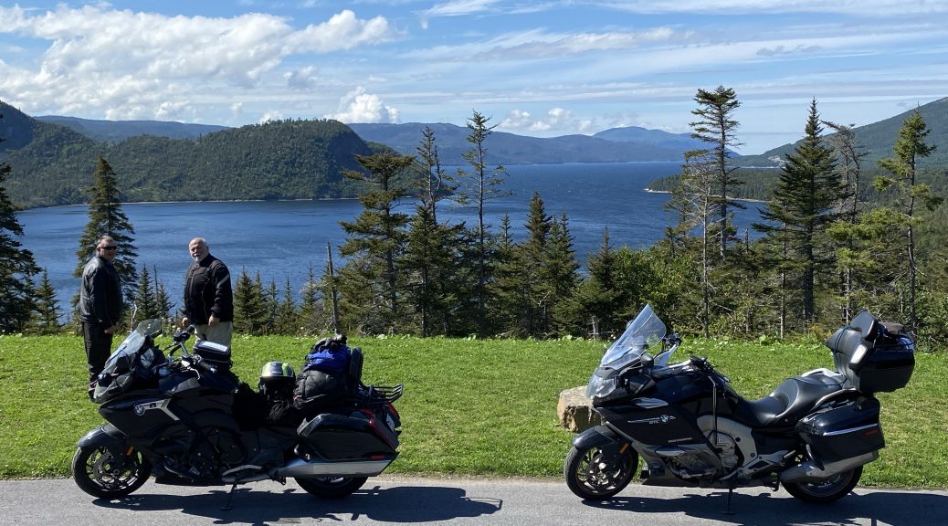 The bikes pose at an overlook of Bonne Bay in Newfoundland.