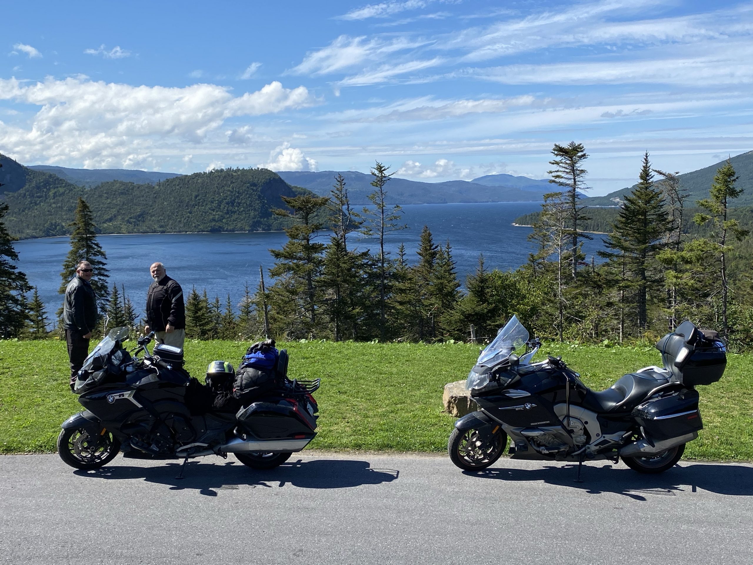 The bikes pose at an overlook of Bonne Bay in Newfoundland.