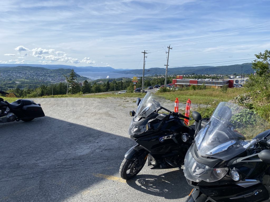 Our bikes have a good view of Corner Brook and the Humber Arm inlet from our hotel parking lot in Newfoundland.