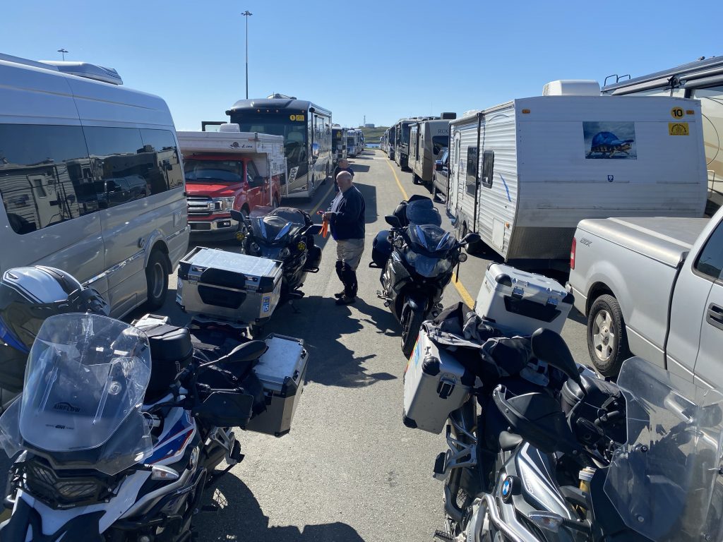 We just arrived at the ferry from Newfoundland to Nova Scotia and, because we’re on motorcycles, we got to cut to the front of the motorcycle line passed all the other poor bastards you see in the other vehicles on either side of us.