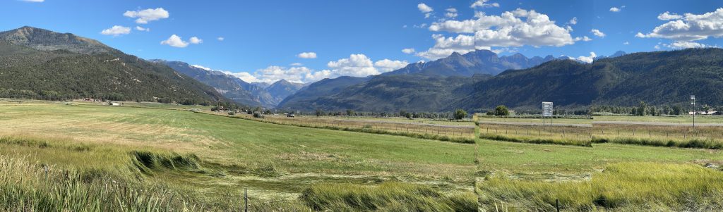 A panoramic view looking back south from US550 in Ridgway, Colorado.