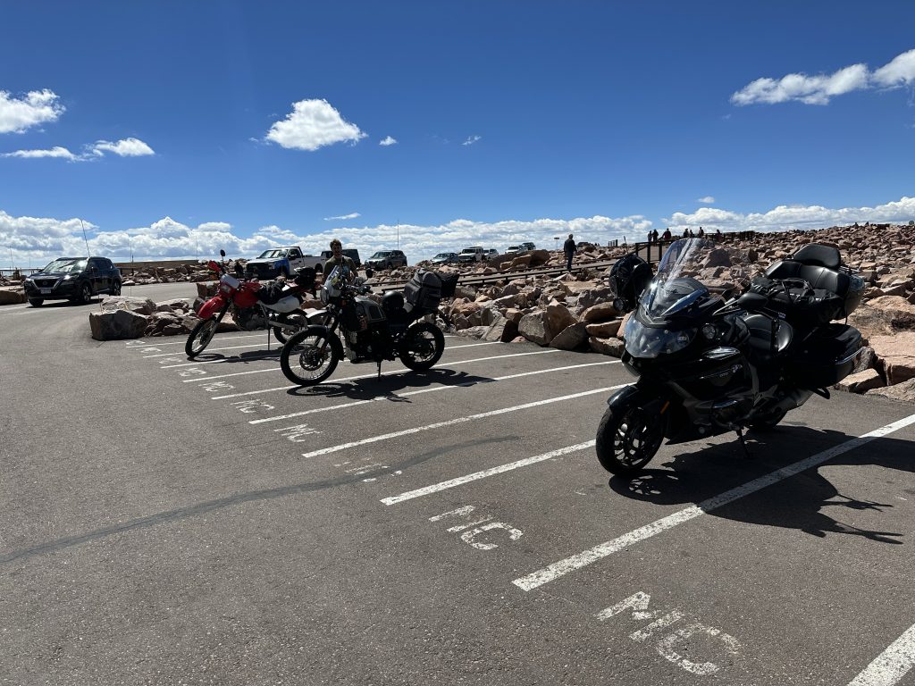 Which one thing is not like the other? The Nightowl and other bikes at the top of Pike’s Peak.